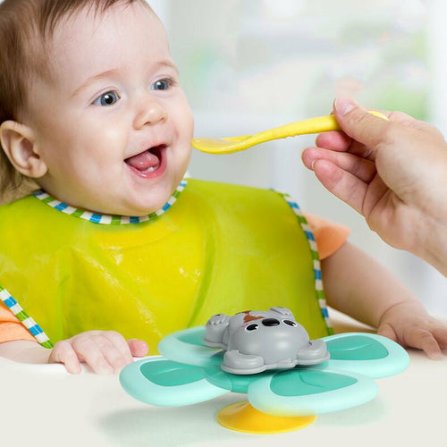 Juguete giratorio de trompo para bebés para bañarse y comer
